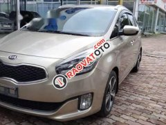 Cần bán Kia Rondo AT sản xuất năm 2015, màu vàng, 620tr