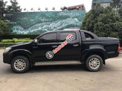 Bán ô tô Toyota Hilux 2.5E năm sản xuất 2014, màu đen, xe nhập Thái Lan