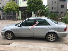 Bán Ford Laser Ghia 1.8MT đời 2003, màu bạc