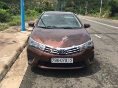 Cần bán xe Toyota Corolla altis 1.8G MT 2014, màu nâu số sàn