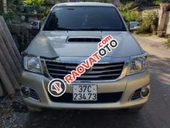 Bán Toyota Hilux G năm sản xuất 2012, màu vàng cát