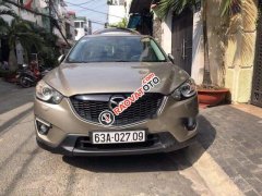 Cần bán xe Mazda CX 5 2.0 đời 2014, màu nâu ít sử dụng