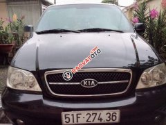 Cần bán xe Kia Carnival GS năm 2009, màu đen số tự động, giá 325tr