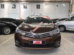 Cần bán lại xe Toyota Corolla altis 1.8MT sản xuất 2014, màu nâu