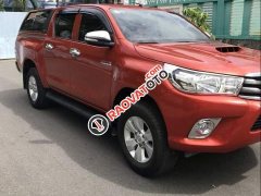 Bán ô tô Toyota Hilux 2.5E năm 2016, màu đỏ, xe nhập số sàn