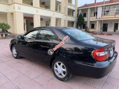 Bán Toyota Camry 2.4 2003, màu đen, giá 29.5tr