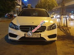 Bán xe Mercedes E400 model 14, màu trắng kem, nhập khẩu nguyên chiếc