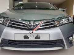 Cần bán lại xe Toyota Corolla altis 1.8G sản xuất 2014, màu bạc xe gia đình giá cạnh tranh