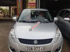 Cần bán lại xe Suzuki Swift 1.4 AT sản xuất 2013, màu bạc, nhập khẩu nguyên chiếc