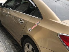 Cần bán xe Chevrolet Cruze LS 1.6 MT đời 2012, màu vàng 