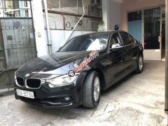 Cần bán xe BMW 3 Series 320 LCI đời 2017, màu đen còn mới