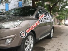 Cần bán xe Hyundai Tucson 2.0 AT sản xuất 2010, màu xám