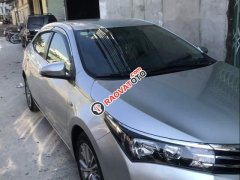 Bán xe Toyota Corolla altis 1.8G 2014, màu bạc số sàn, 560tr