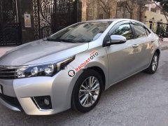 Bán Toyota Corolla altis 1.8G MT 2014, màu bạc như mới, 560tr