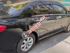 Cần bán Toyota Corolla altis 1.8 năm 2009, màu đen số tự động