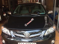 Cần bán xe Toyota Corolla Altis đăng ký lần đầu 28/12/2012, màu đen, hỗ trợ trả góp ngân hàng