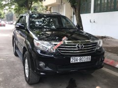 Bán xe Toyota Fortuner V 4x4 AT 2014 còn mới đăng ký, chính chủ