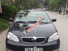 Gia đình bán xe Toyota Corolla Altis MT năm 2003, màu đen