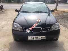 Cần bán xe Daewoo Lacetti MT đời 2004, màu đen, giá tốt