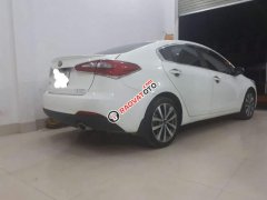 Bán Kia K3 MT 2014, màu trắng giá cạnh tranh
