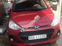 Bán Hyundai Grand i10 1.0 AT sản xuất 2017, màu đỏ, xe đã đi 17k km