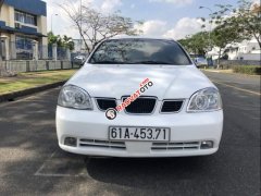 Cần bán lại xe Daewoo Lacetti đời 2004, màu trắng, nhập khẩu, xe cam kết không ngập nước Cần bán lại xe Daewoo Lacetti đời 2004, màu trắng, nhập khẩu, xe cam kết không ngập nước