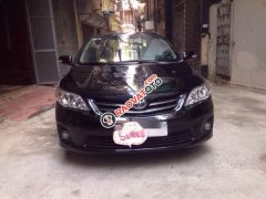 Cần bán Toyota Corolla altis 1.8G AT sản xuất 2014, màu đen chính chủ, giá chỉ 595 triệu