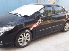 Cần bán Toyota Corolla altis 2.0AT 2009, màu đen, nhập khẩu xe gia đình