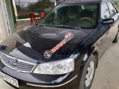 Cần bán xe Ford Laser Ghia sản xuất năm 2004, màu đen