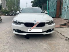 Cần bán xe BMW 320i 2014 ĐK 2015, số tự động màu trắng