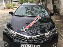 Bán Toyota Corolla altis 2.0V 2014, màu đen số tự động, giá chỉ 645 triệu