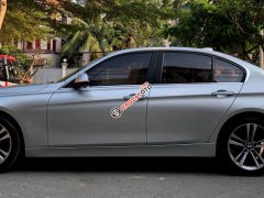 Bán BMW 320i Sportline 2014 màu bạc chính chủ