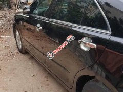 Bán Toyota Camry 2.0E sản xuất 2011, màu đen, xe nhập chính chủ