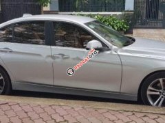 Cần bán gấp BMW 3 Series 320i năm 2014, màu bạc, nhập khẩu