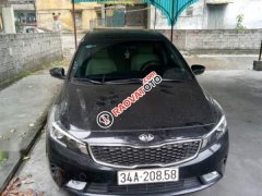 Cần bán lại xe Kia Cerato MT sản xuất 2017, màu đen, xe mua từ mới