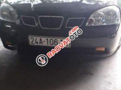 Bán Daewoo Lacetti MT năm sản xuất 2004, màu đen, máy 1.6 ít xăng