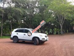 Cần bán xe Kia Sorento 2WD AT đời 2013, màu trắng, vẫn lốp zin từ lúc mới mua