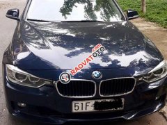 Bán BMW 320i sản xuất 2015, màu xanh đen, đi 36.000km, chính chủ bán