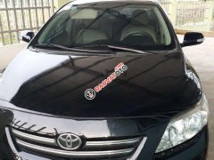 Cần bán xe Toyota Corolla altis đời 2009, màu đen