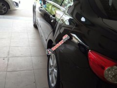 Cần bán xe Toyota Corolla altis AT đời 2011, màu đen số tự động, biển Hà Nội