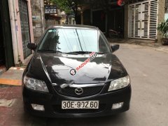 Bán Mazda 323 GLX sản xuất 2003, màu đen, giá tốt