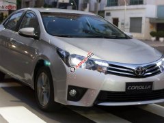 Bán ô tô Toyota Corolla Altis 1.8MT đời 2016, màu bạc, xe như mới đi 2,1 vạn km
