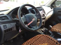 Bán Mitsubishi Triton 4x2 MT đời 2016, màu bạc, nhập khẩu 