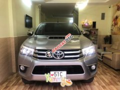 Bán Toyota Hilux 3.0G AT 2 cầu năm sản xuất 2015, màu bạc, nhập khẩu Bán Toyota Hilux 3.0G AT 2 cầu năm sản xuất 2015, màu bạc, nhập khẩu