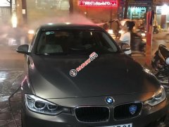 Bán BMW 3 Series 320i sản xuất 2014, màu nâu, nhập khẩu nguyên chiếc, giá chỉ 870 triệu