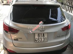 Bán xe Hyundai Tucson AT đời 2011, màu bạc, giá 520tr