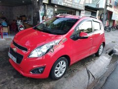 Cần bán xe Chevrolet Spark AT sản xuất năm 2014, màu đỏ Cần bán xe Chevrolet Spark AT sản xuất năm 2014, màu đỏ