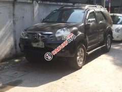 Bán Toyota Fortuner 2.5G đời 2011, màu đen, 580 triệu