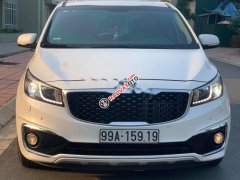 Bán xe Kia Sedona năm 2016, màu trắng xe còn mới Bán xe Kia Sedona năm 2016, màu trắng xe còn mới