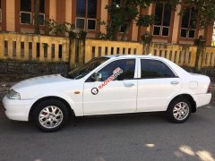 Bán Ford Laser đời 2000, màu trắng xe gia đình, 100tr Bán Ford Laser đời 2000, màu trắng xe gia đình, 100tr